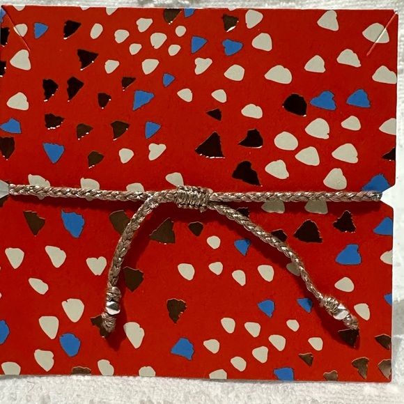 Stella and dot braided silver bracelet with lips charm, in original packaging. - Picture 7 of 8